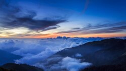 Blanket Of Clouds On Mountains At Sunset Wallpaper