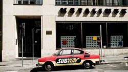 Classic Car In Front Of An Old Building Wallpaper #588925