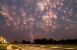 Lightning Out Of Puffy Clouds Wallpaper