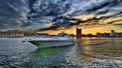 Powerboat Gliding Out Of Harbor Hdr Wallpaper