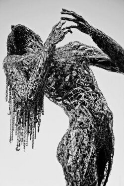 Sculpture Made Out Of Recycled Scrap Metal Wallpaper