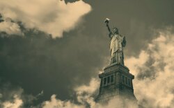 Statue Of Liberty In The Clouds Wallpaper